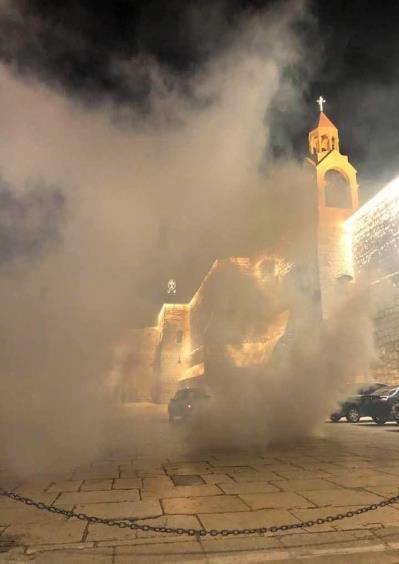 old square in Jerusalem with smoke